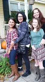 Carmela Cortes with her family after stoke rehabilitation at IGEA Brain and Spine